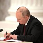 Putin signs decree toughening penalties for fleeing Russia's military mobilization