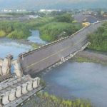 Typhoon batters Japan with record rain, killing two