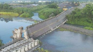 Typhoon batters Japan with record rain, killing two