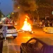 Iranian protesters set fire to police station as unrest over woman’s death spreads